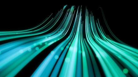 Wave lines trails flowing dynamic in green colors iStock-1369278833(1).webp